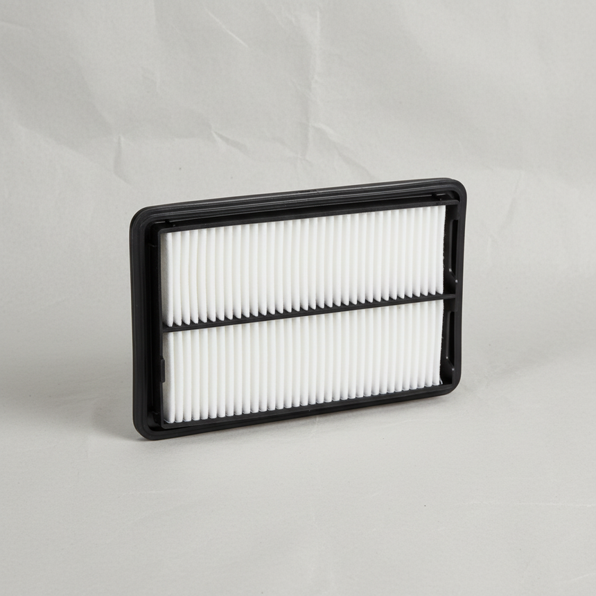 2014-2019 Nissan Rogue 2017-2018 Rogue Sport OEM Engine Air Filter on grey wrinkled kraft paper background