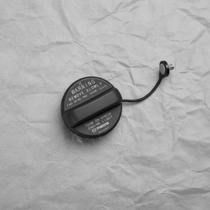 Full View - Fuel Tank Filler Gas Cap on Grey Kraft Paper