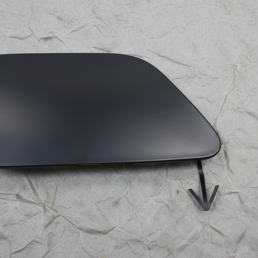 Nissan LEAF OEM Front Bumper Tow Bracket Cover - Macro Bottom 1