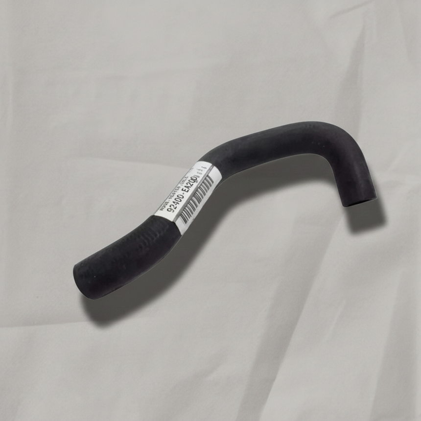 Full view of heater hose on light grey wrinkled kraft paper