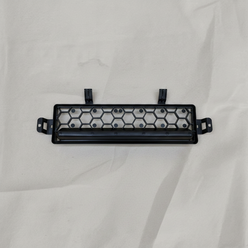 2015-2020 Ford F-150 F-250 F-350 Passenger Side Cabin Air Filter Cover OEM on grey wrinkled craft paper background
