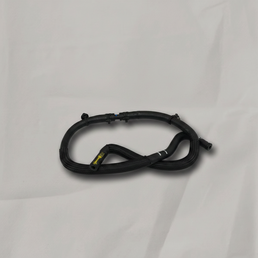 Radiator Surge Tank Inlet Hose on grey wrinkled kraft paper background