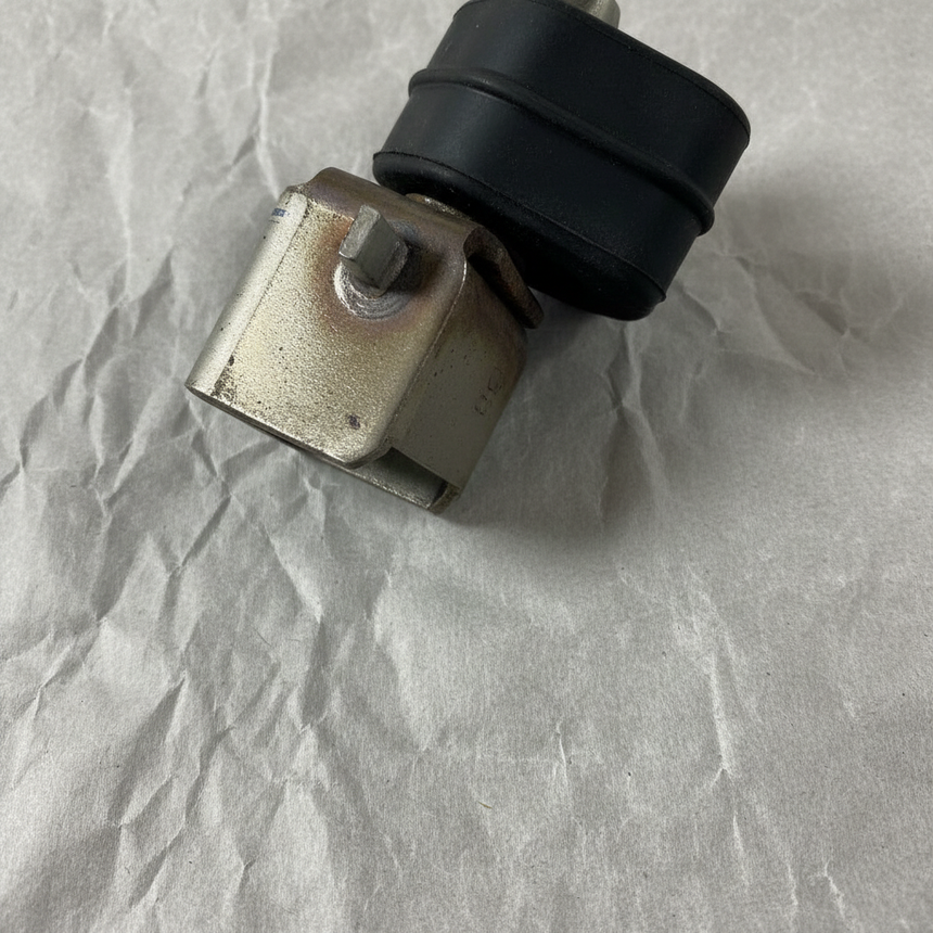 2015-2023 Charger or 300 Passenger Side Rear Exhaust Hanger Bracket OEM – Bottom Macro Crop on kraft paper