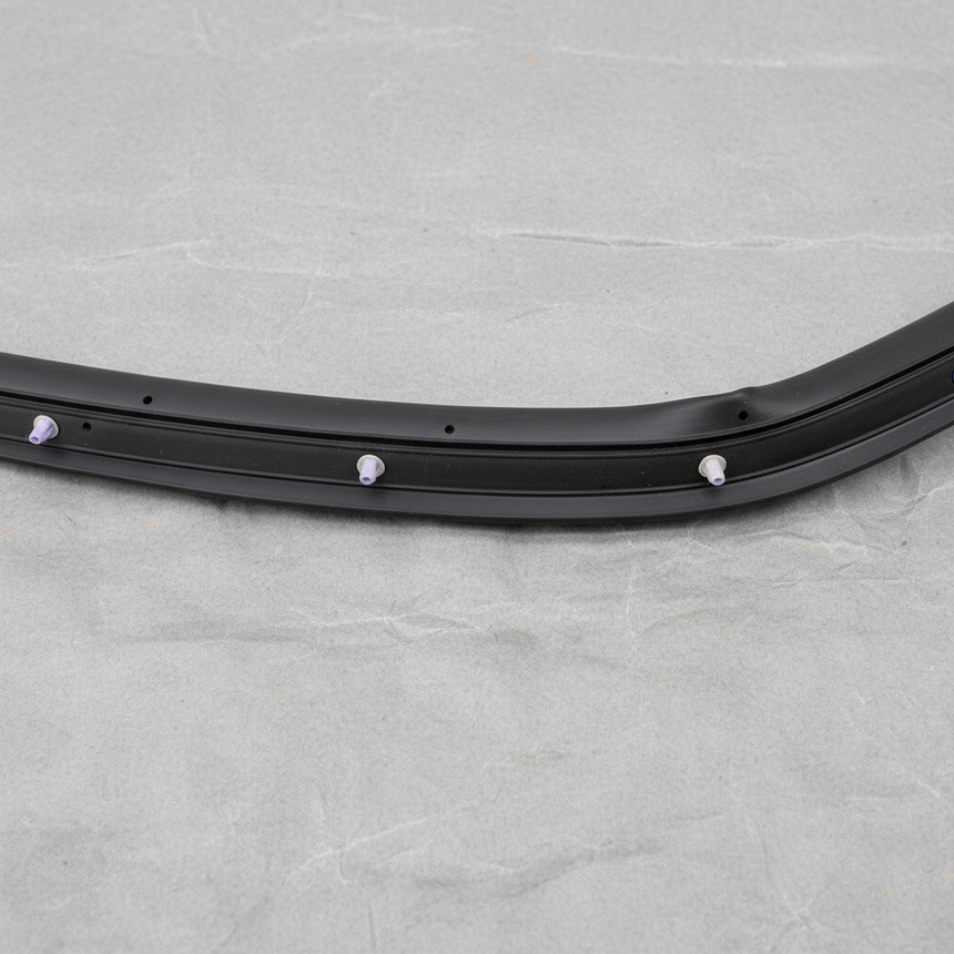 Close-up alternate angle of Nissan OEM Passenger Side Rear Door Mounted Weatherstrip for Versa