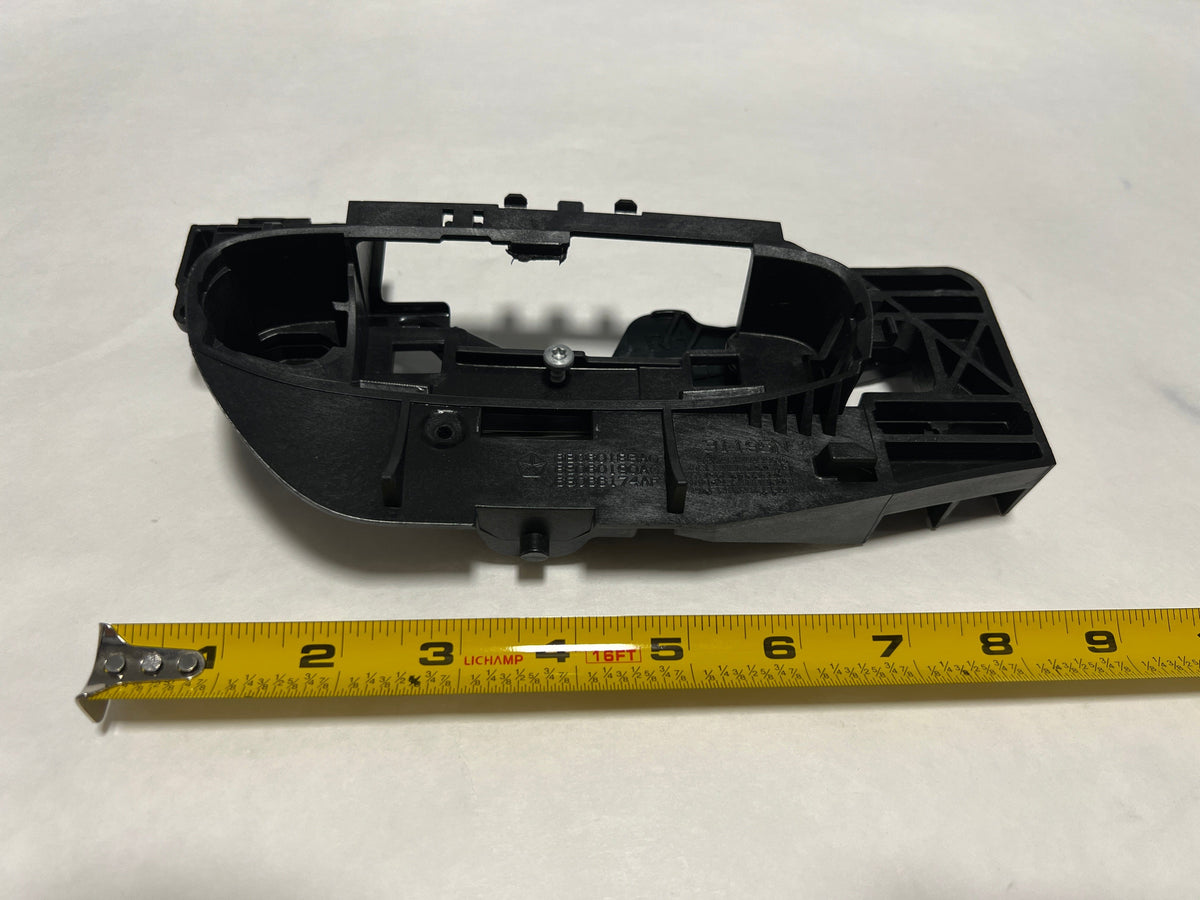 Genuine OEM Mopar passenger front door handle bracket for Dodge Charger