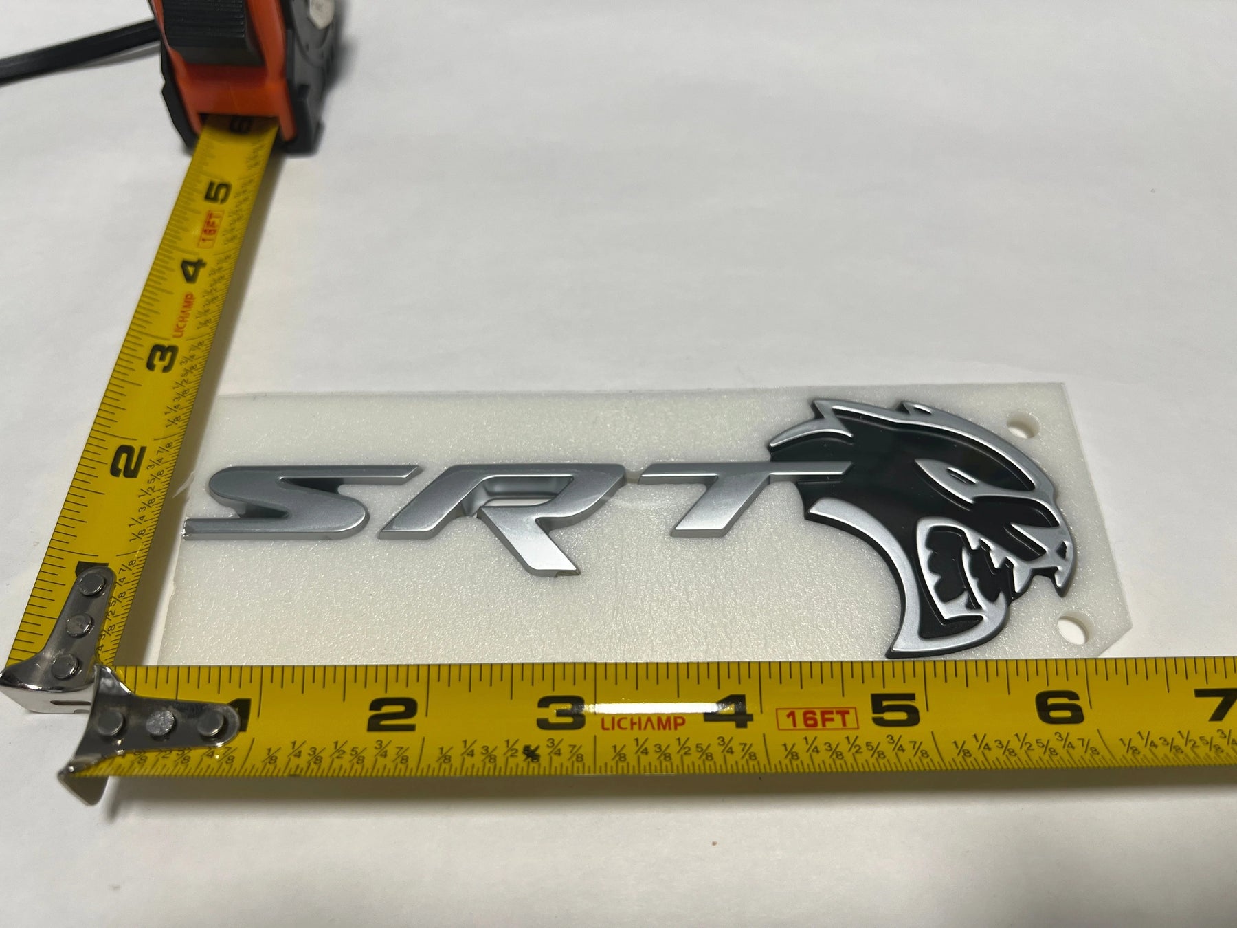 Upgrade Your Dodge Challenger with Conquest Auto’s Hellcat Black and Silver SRT Trunk Emblem