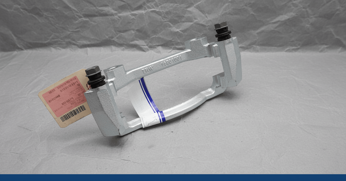 5143351AB 2005-2024 Ram 1500 Dakota Durango Front Brake Caliper Bracket OEM