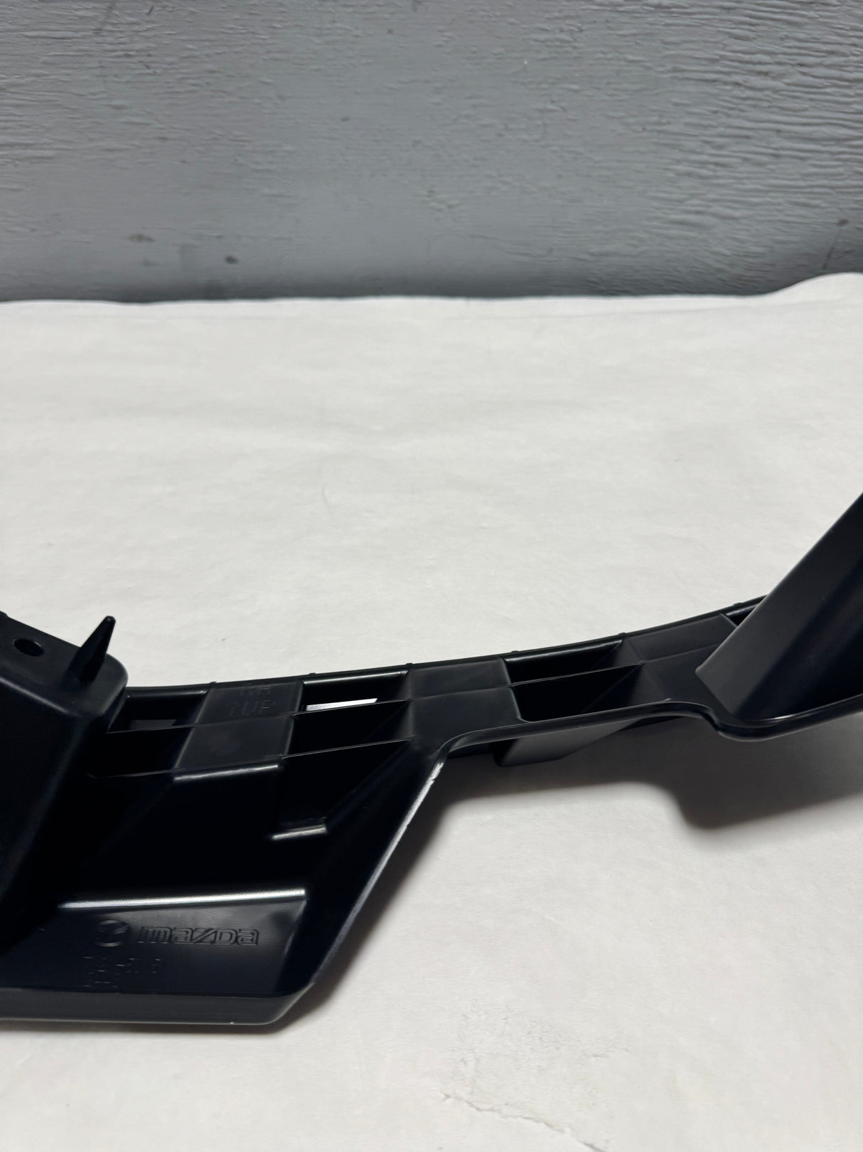 DEL-TK21-50-151 2013-2015 Mazda CX-9 Front  Passenger Side Lower Bumper Bracket OEM