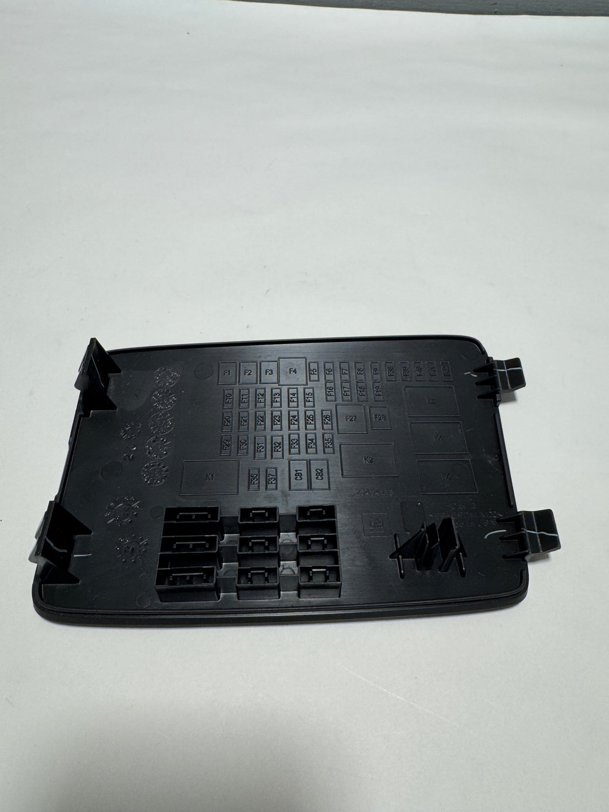 23454119-E1 2016-2025 Chevrolet Malibu Black Interior Fuse Block Cover Genuine OEM