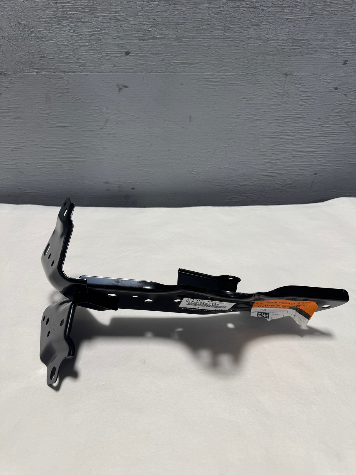 KDPW-52-240A 2017-2023 Mazda CX-5 Driver Side Fender Stay Bracket OEM