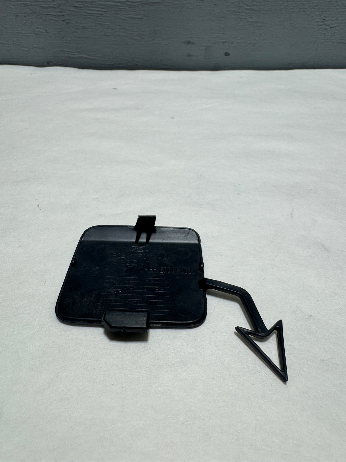 JR3Z-17E811-A 2018-2023 Ford Mustang Front Tow Hook Hole Cover OEM - Unpainted