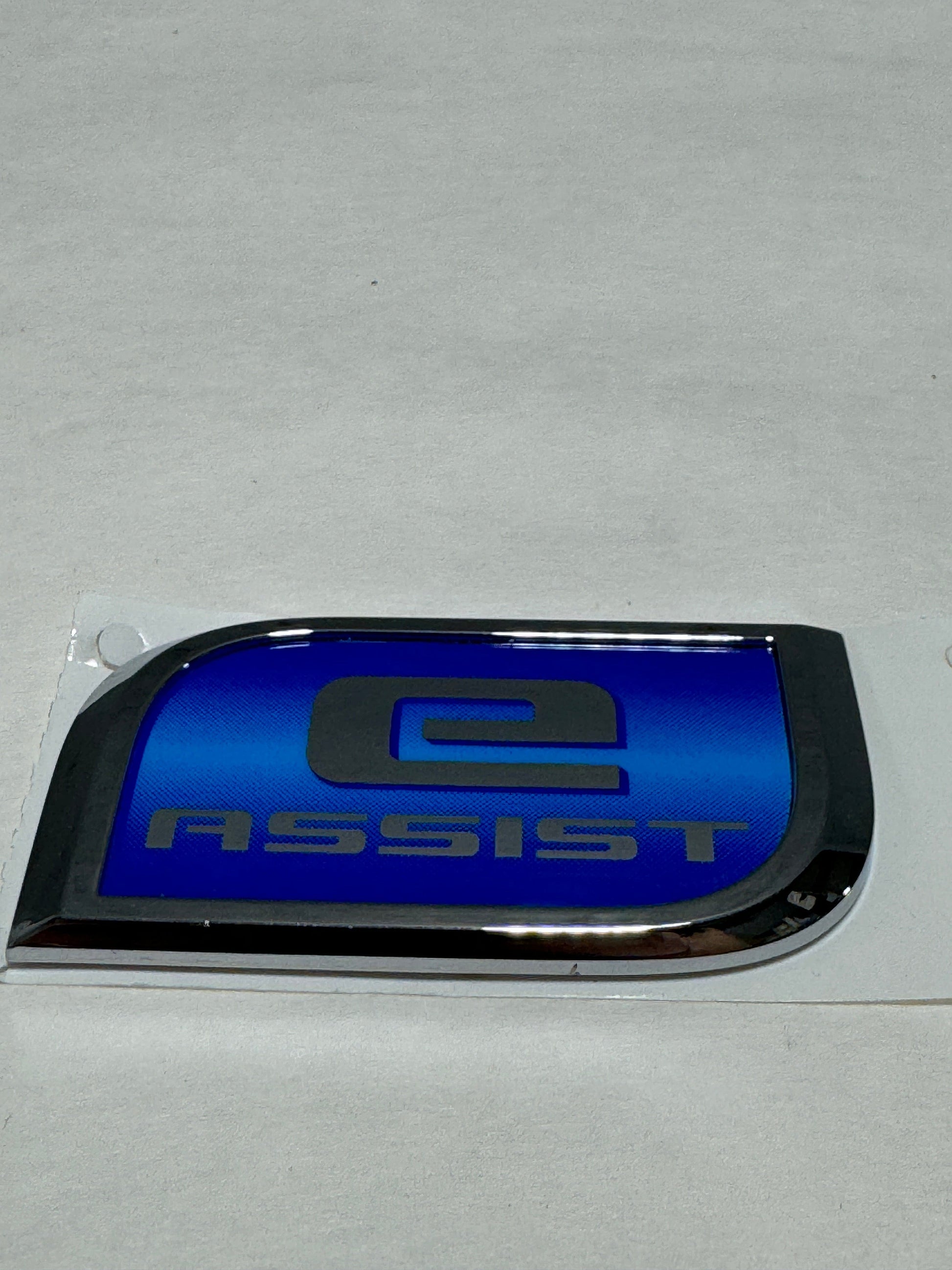 CL-EMBLEM-0924-23462308-D21 2018 Silverado or Sierra Tail Gate Blue E- Assist Emblem OEM