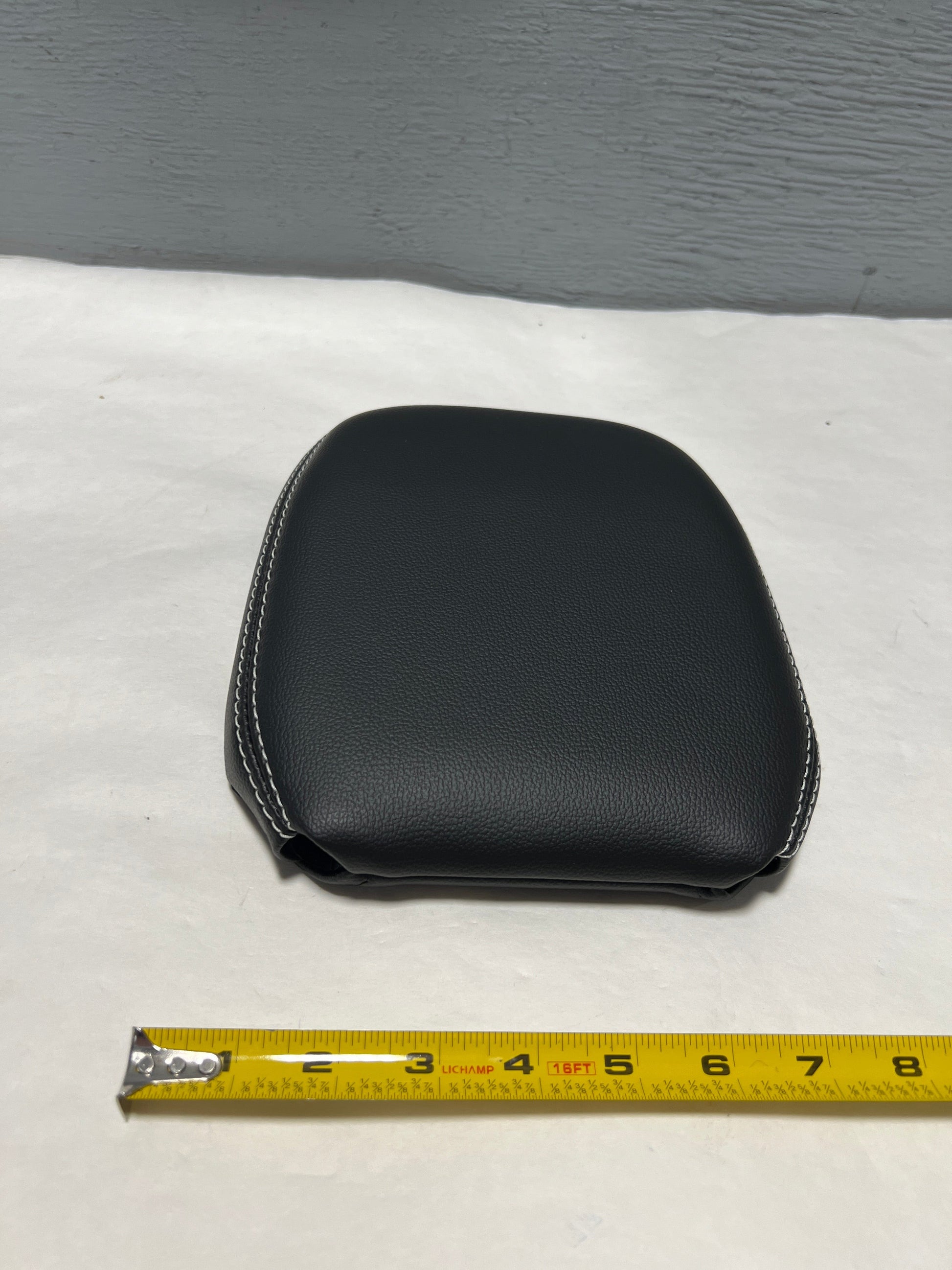 https://conquestauto.com/cdn/shop/files/2020-2024-ford-explorer-3rd-row-seat-headrest-black-leather-genuine-oem-43243623842079.jpg?v=1696618909&width=1946