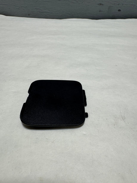 VA40-50-EL1 2023-2024 Mazda CX-50 Driver Side  Rear Bumper Towing Hook Cover Unpainted OEM