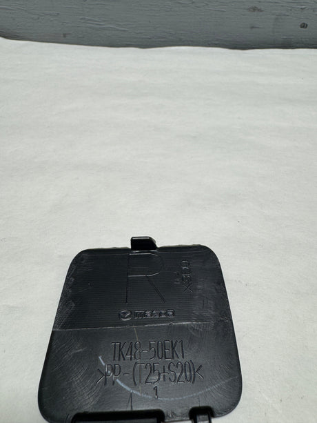 VA40-50-EL1 2023-2024 Mazda CX-50 Driver Side  Rear Bumper Towing Hook Cover Unpainted OEM