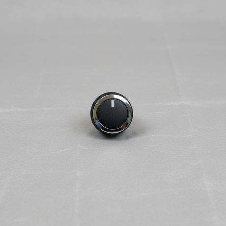 OEM HVAC Temp Control Knob on grey wrinkled craft paper background