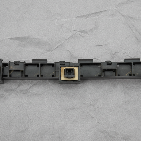 Close-up of Honda OEM Rear Driver Side Bumper Bracket Retainer for 2017-21 Civic FK Hatchback