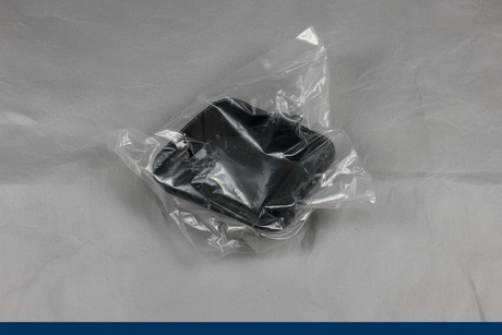 2014-2019 Toyota Corolla Trunk Passenger Side Cover Genuine OEM - Rotated 27 degrees on gray kraft paper background