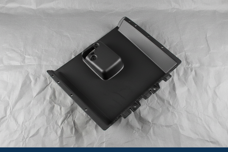 2008-2024 Chevrolet Express/GMC Savana Dashboard Lower Compartment Door OEM - detail view on kraft paper