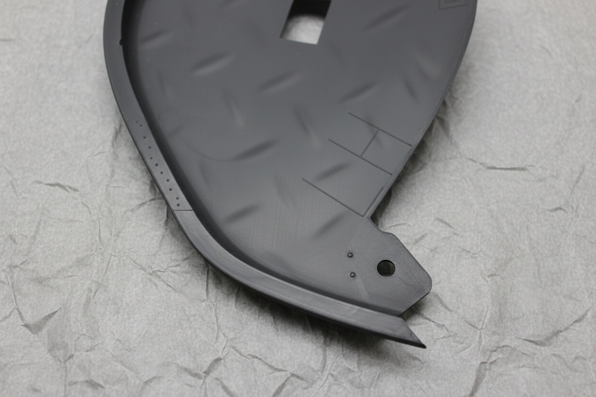 Driver Side Rear Bumper Outer Step Pad - Bottom Detail Angle 2