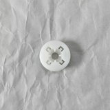 Full view on light grey wrinkled kraft paper background