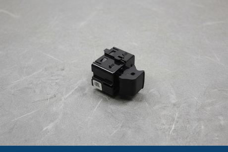 2021-2025 Ford F-150 Sliding Rear Window Switch - Detail view on gray kraft paper