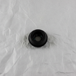 Full view of rear wiper motor seal on light grey wrinkled kraft paper