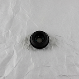 Full view of rear wiper motor seal on light grey wrinkled kraft paper
