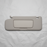 Middle macro crop on light grey wrinkled kraft paper background