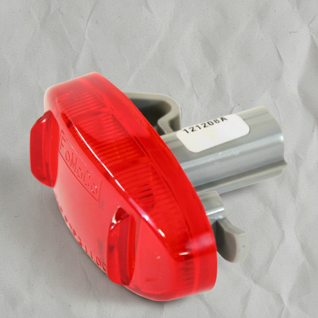 Ford F-350 F-450 Red Side Marker LED Lamp - Top Detail on gray wrinkle kraft paper