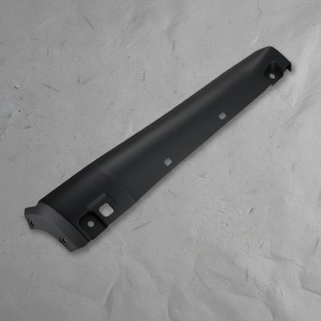 2023-2026 Ford Super Duty OEM Rear Stone Guard Black Passenger Rock Deflect - rotated 30 degrees on kraft paper background