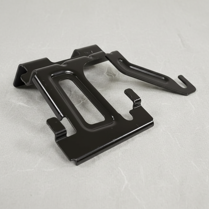 2018-2022 Ford EcoSport Driver Side OEM Radiator Grille Bracket on grey wrinkled kraft paper background