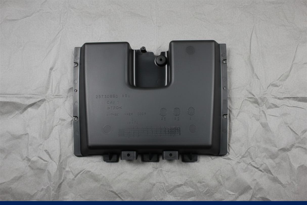 2008-2024 Chevrolet Express/GMC Savana Dashboard Lower Compartment Door OEM - close-up on kraft paper