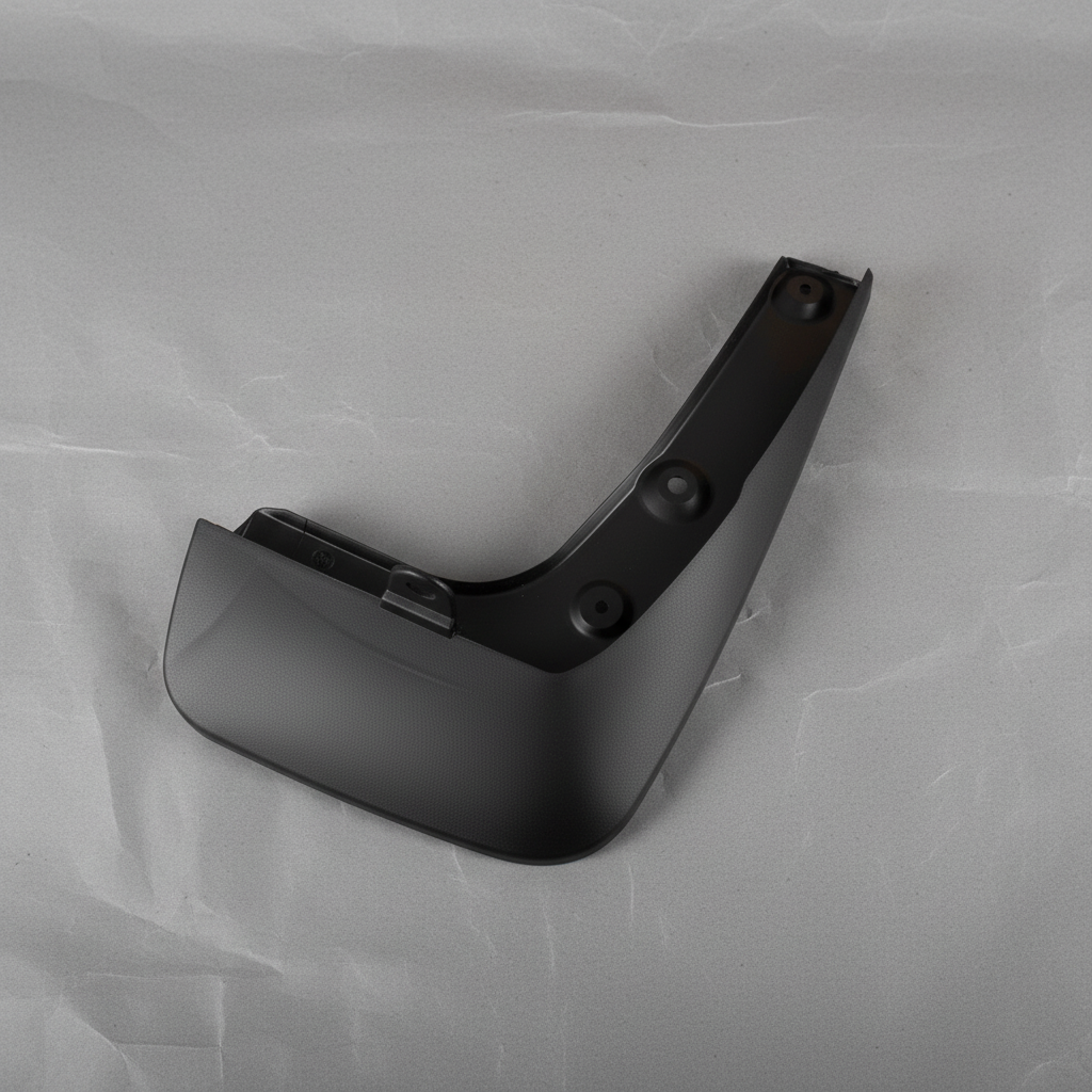 2020-2025 Highlander AWD Driver Side Front Mudguard OEM - rotated 30 degrees on kraft paper background