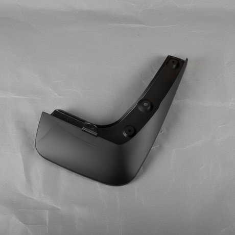 2020-2025 Highlander AWD Driver Side Front Mudguard OEM - rotated 30 degrees on kraft paper background