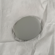 Full view on light grey wrinkled kraft paper background