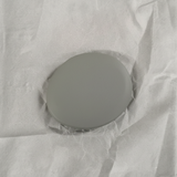 Full view on light grey wrinkled kraft paper background