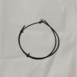OEM Windshield Washer Hose on grey wrinkled craft paper background
