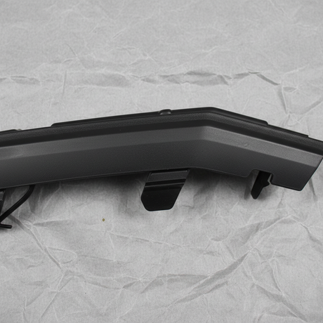 Close-up alternate angle of Toyota OEM Driver Side Front Bumper Hole Cover for 2016-19 Highlander