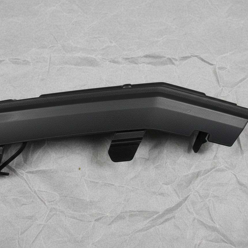 Close-up alternate angle of Toyota OEM Driver Side Front Bumper Hole Cover for 2016-19 Highlander