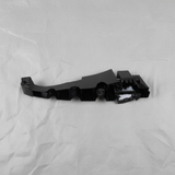 Full view of Dodge Charger rear bumper fascia support bracket on light grey wrinkled kraft paper
