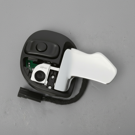 5RQ08DX9AD 2015-2026 Chrysler Dodge Jeep Paddle Up Switch - Rotated 30 degrees with kraft paper background