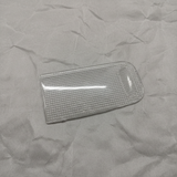 Honda Pilot Passport Ridgeline front dome lens on light grey wrinkled kraft paper background, packaging removed