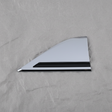 Full View - Passenger Side Fender Emblem on Grey Kraft Paper