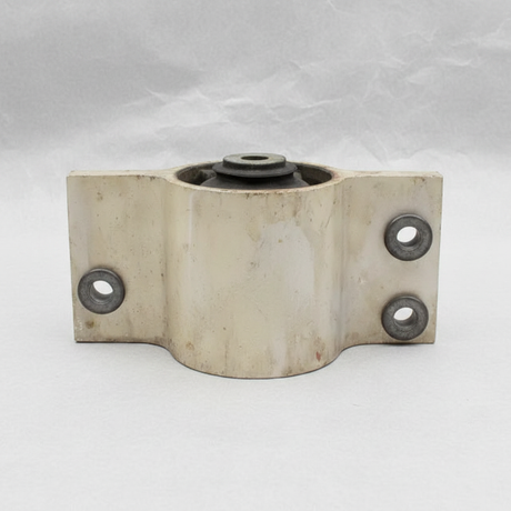2017-2022 Ford F-250 F-350 Super Duty Driver Side OEM 6.2L Motor Mount on grey wrinkled kraft paper background