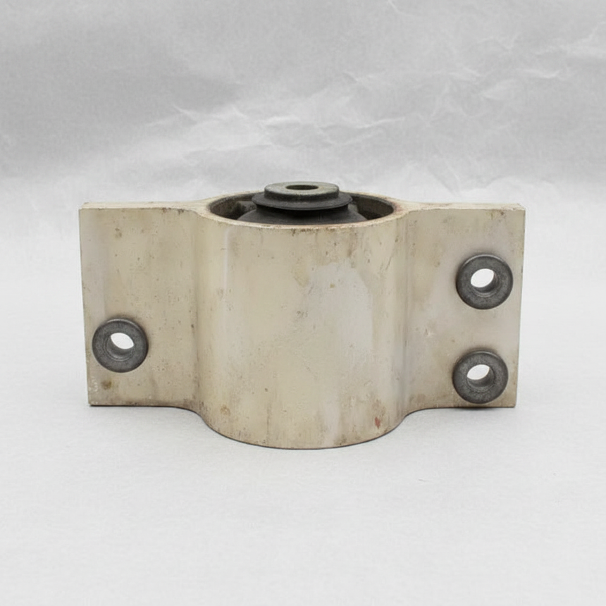 2017-2022 Ford F-250 F-350 Super Duty Driver Side OEM 6.2L Motor Mount on grey wrinkled kraft paper background