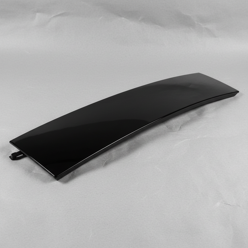 2018-2024 Ford Expedition Passenger Side Front Door Applique OEM JL1Z-7820554-B on grey kraft paper background