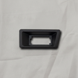 OEM License Plate Lamp Bezel on grey wrinkled craft paper background