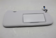 2020-2022 Honda CR-V Passenger Side Front Sun Visor on grey wrinkled craft paper background