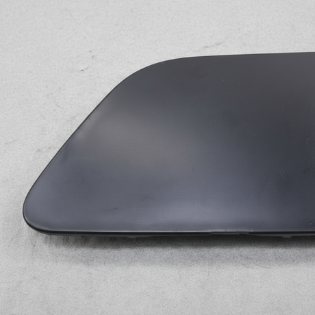 Nissan LEAF OEM Front Bumper Tow Bracket Cover - Macro Middle 1